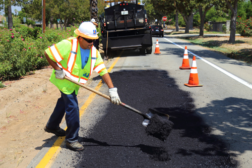 Public Works department fixing potholes