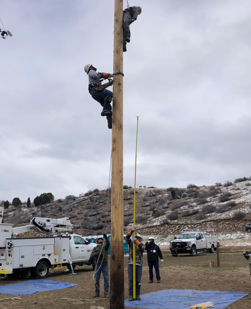 linemen compete during rodeo event