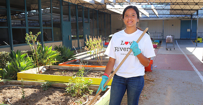 Riverside girl gardening